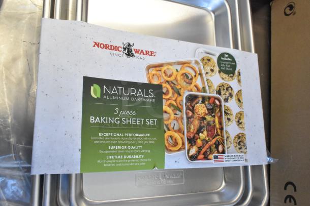 Nordic Ware Naturals 3-piece baking sheet set, aluminum pans with wire rims, new condition, includes sheet, jelly roll, and half sheet.