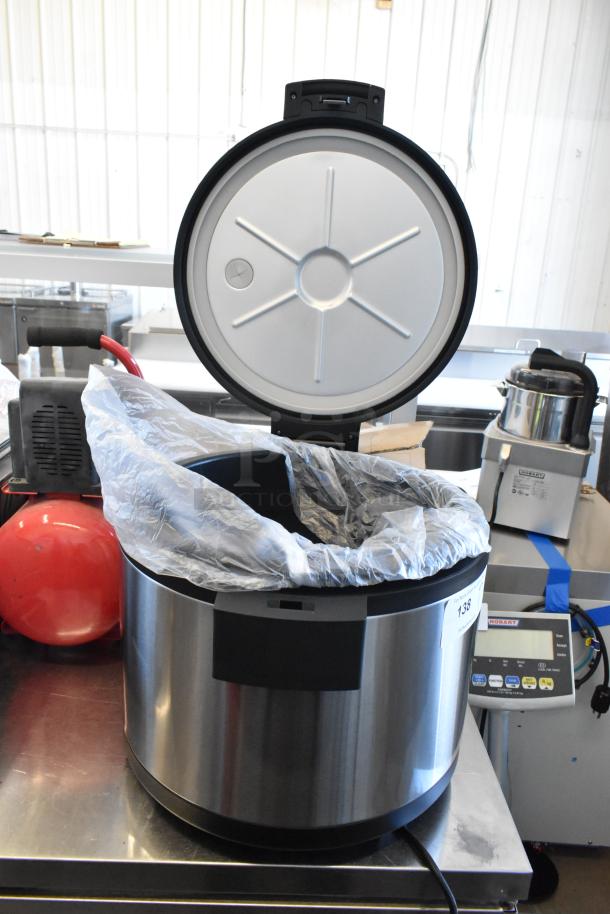 Brand new Avantco 177RWB92 electric rice warmer; 92 cup capacity; 120 volts; scratch and dent condition; with protective cover.