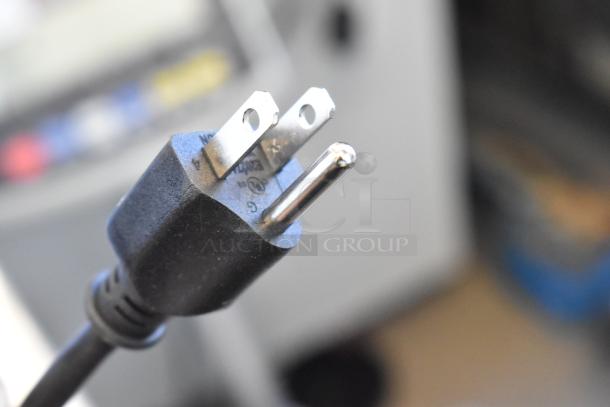 Alt Text: Close-up of a power plug for the Avantco 177RWB92 electric rice warmer.