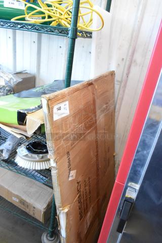 Brand new Avantco 60 1/8" cutting board and Regency 30" x 48" poly table top in packaging, labeled as scratch and dent.