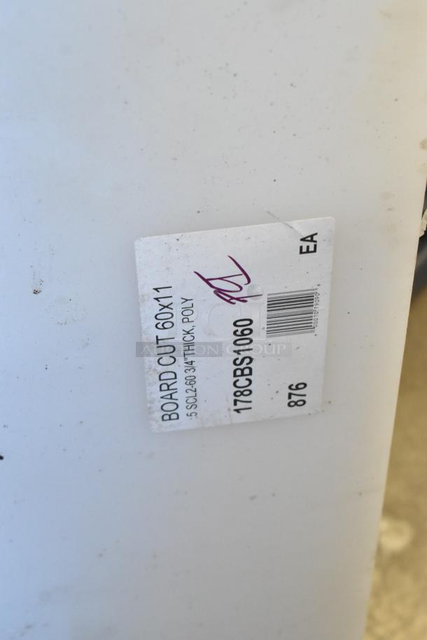 Label on Avantco 178CBS1060 cutting board. Marked "BOARD CUT 60X11". Slight scratches visible.