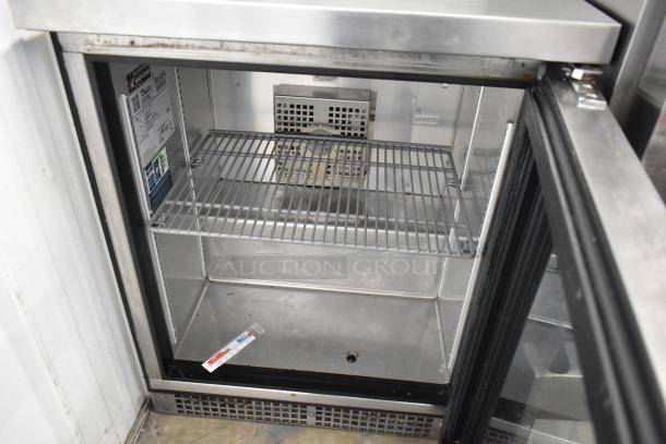 2019 True TUC-24G-HC stainless steel undercounter cooler, glass door, with interior shelving. 115V, 1 phase. Clean interior.