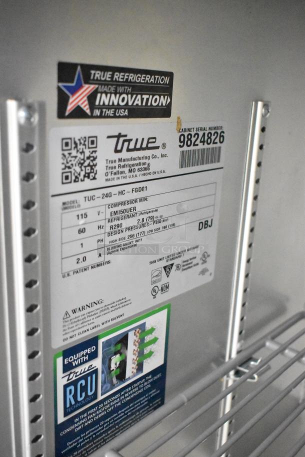 2019 True TUC-24G-HC stainless steel undercounter cooler. Model and serial info visible. 115 volts, single phase.