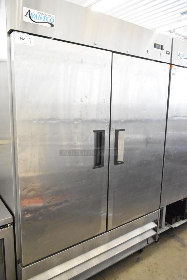 Avantco 178A49FHC stainless steel commercial 2-door reach-in freezer with poly coated racks and commercial casters.
