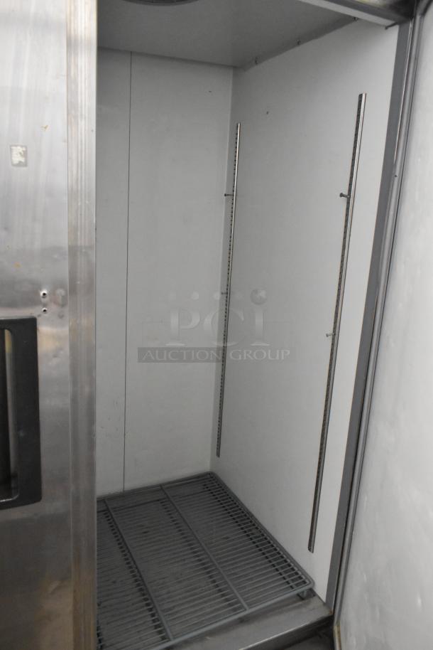 Avantco 178A49FHC stainless steel 2-door commercial freezer with poly-coated racks and commercial casters, 115V.