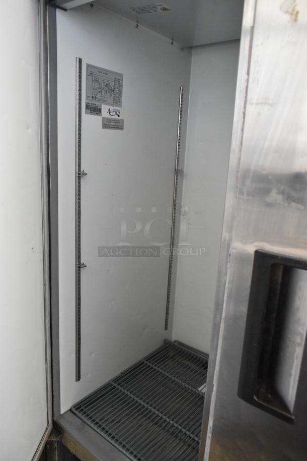 Avantco 178A49FHC stainless steel commercial 2-door reach-in freezer with poly-coated racks, commercial casters, 115V, 1 Phase.