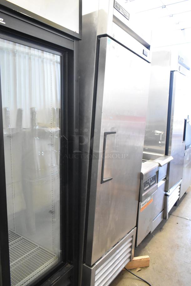 2019 True TS-23F-HC stainless steel single door freezer with poly coated racks, commercial casters, 115V, 1 phase.