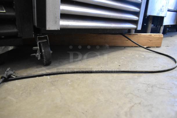 2019 True TS-23F-HC stainless steel reach-in freezer, poly-coated racks, on commercial casters. 115V, single phase.