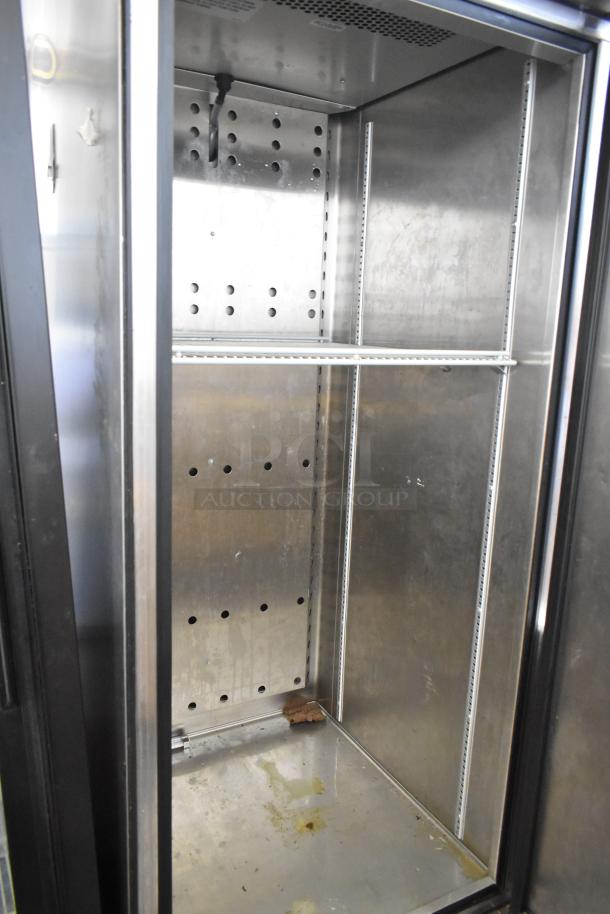 2019 True TS-23F-HC stainless steel single door freezer with poly coated racks, commercial casters, 115V, used condition.