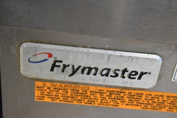 Frymaster RE114TCSC stainless steel electric fryer label, showing brand and safety warning, 208V, 3-phase.