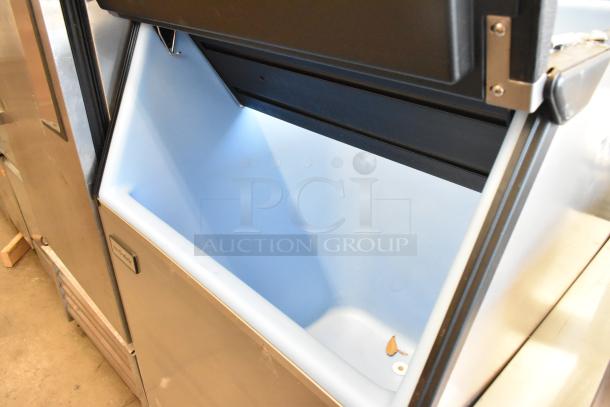 2023 Ice-O-Matic B55PSC 30" stainless steel ice bin, 510 lbs capacity. Clean interior, visible Ice-O-Matic label.