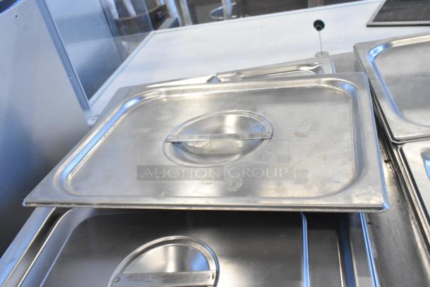 Wells TMPT stainless steel commercial countertop food warmer, 120 volts, 1 phase, includes lids, used condition.