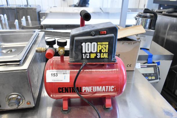 Central Pneumatic 100 PSI 3 Gallon 1/3 HP Air Compressor, red tank, 115 Volts, 1 Phase, in good condition. Model details on label.
