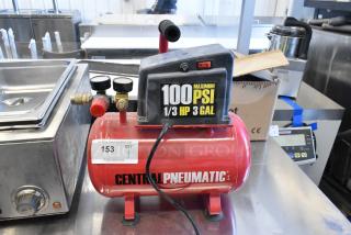 Central Pneumatic 100 PSI 3 Gallon 1/3 HP Air Compressor, red tank, 115 Volts, 1 Phase, in good condition. Model details on label.