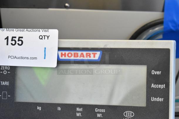 Hobart RW Metal Scale, used condition, Model RW, features a digital display, visible Hobart logo, and auction tag.