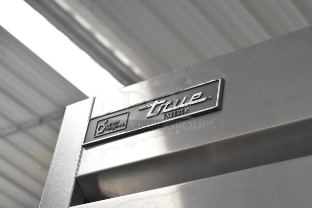 2019 True T-23F-HC stainless steel commercial freezer, single door, poly coated racks, caster wheels, 115V, 1 phase.