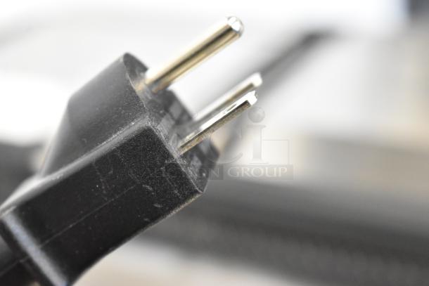 Close-up of the plug for a 2024 Vollrath TSI8002 Stainless Steel Commercial Panini Press. 208-240V, 1 Phase.