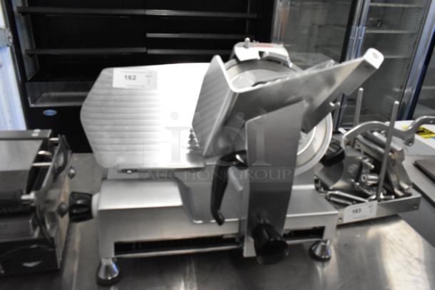 Avantco 177SL512 stainless steel meat slicer with blade sharpener, 115V, 1 phase, commercial countertop model, excellent condition.