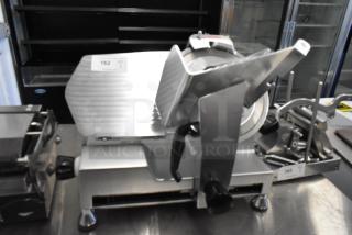 Avantco 177SL512 Stainless Steel Commercial Countertop Meat Slicer w/ Blade Sharpener. 115 Volts, 1 Phase. - Item #1219338