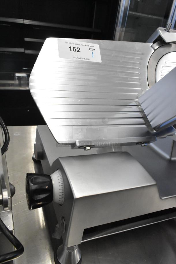 Avantco 177SL512 stainless steel commercial meat slicer with blade sharpener, 115V, 1 phase, in excellent condition.