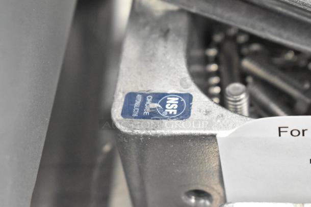 Choice 407ONSLIC316 metal commercial lettuce cutter, NSF certified. Visible metal finish, screws, and label indicating model.