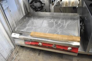Brand new Avantco 30" stainless steel flat top griddle with packaging. Slight scratches noted. Three temperature controls.
