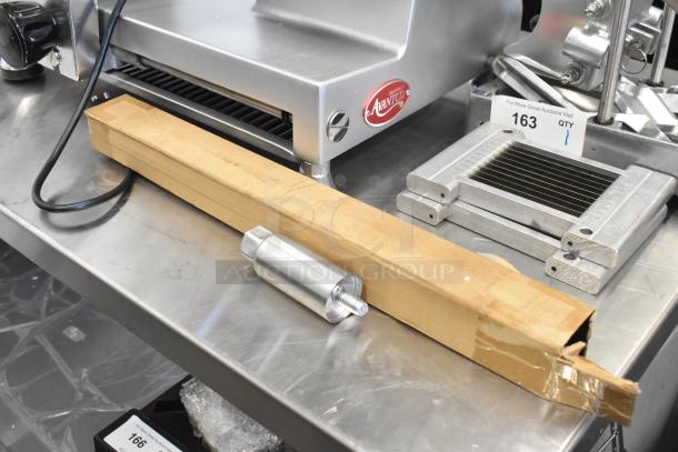 Brand new Avantco 30" stainless steel flat top griddle with minor scratches and dents. Features durable construction.