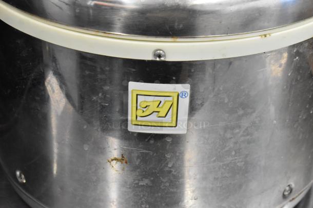 Thunder Group SEJ-20000 stainless steel rice cooker, noticeable wear, 115 volts, model label visible, used condition.