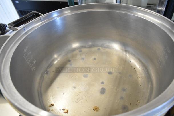 Rinnai RER-55AS-N natural gas rice cooker, metal interior with capacity markings, used condition, countertop design.