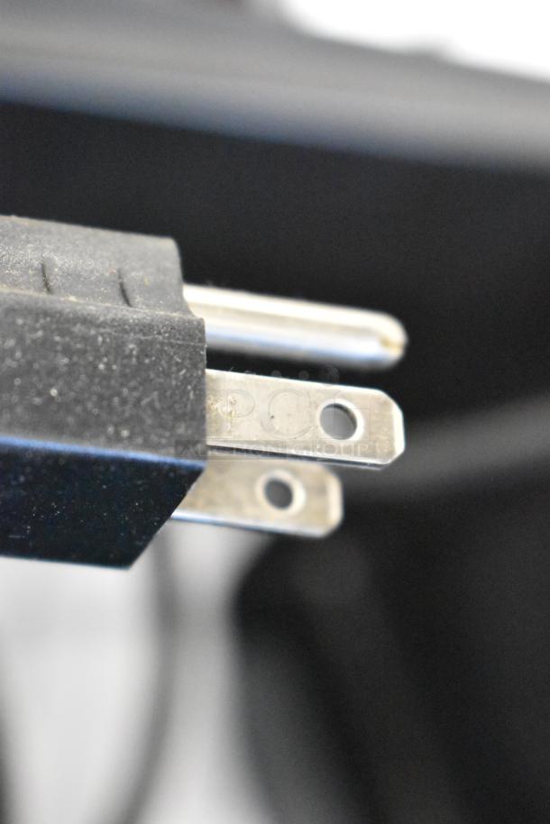 Close-up of a power plug for Server IS-1/3 Intelliserv food warmer, 120 volts, stainless steel, countertop model.