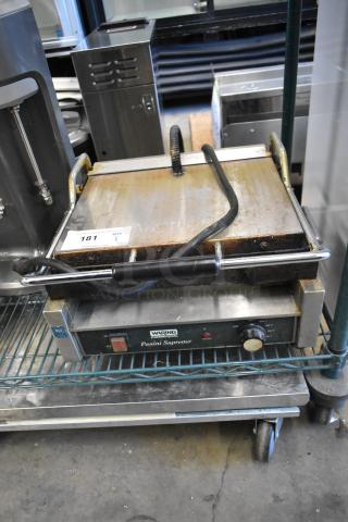 Waring WPG250B stainless steel commercial panini press, 208V, 1 phase, with temperature control knob. Used condition.