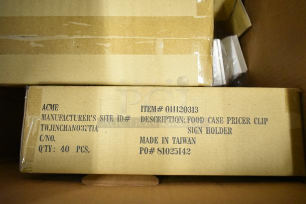 8 brand new boxes, each with 40 Acme 011120313 food case pricer clip sign holders. Made in Taiwan, PO# 81025142.