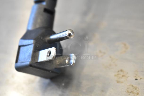 Close-up of a black three-prong power plug for the KoolMore KM-RMD12WH cooler.