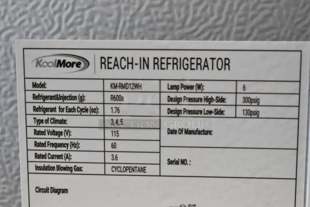 KoolMore KM-RMD12WH metal single door reach-in cooler label showing model details, 115V, R600a refrigerant. New condition.