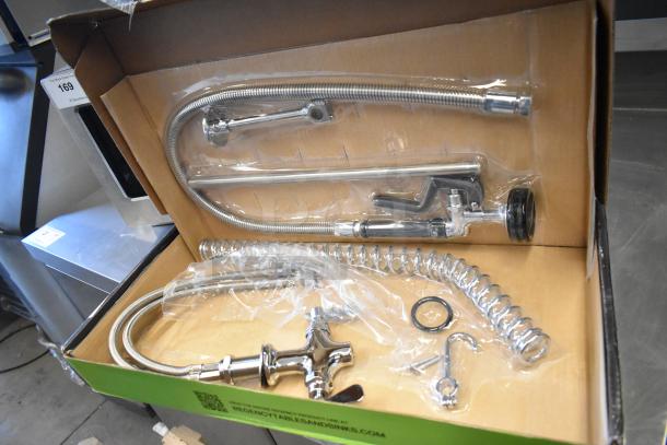 Brand new Hi Tek Regency 600PRDX pre-rinse faucet, 1.15 GPM, deck-mounted, 44" hose, slight scratch and dent.