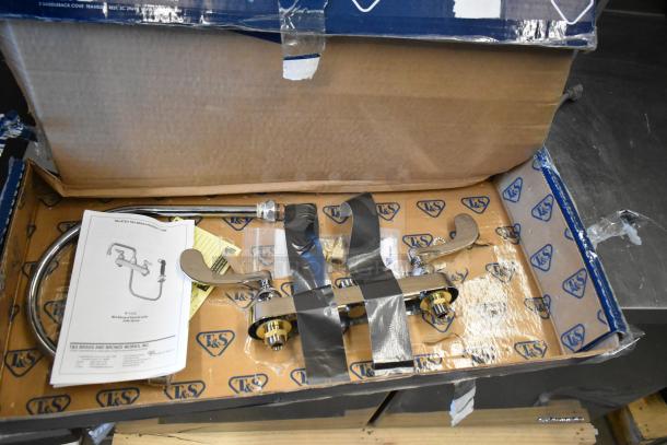 BRAND NEW SCRATCH AND DENT T&S B-1120-135X-WH4 deck-mounted faucet with gooseneck spout, wrist handles, and manual in box.