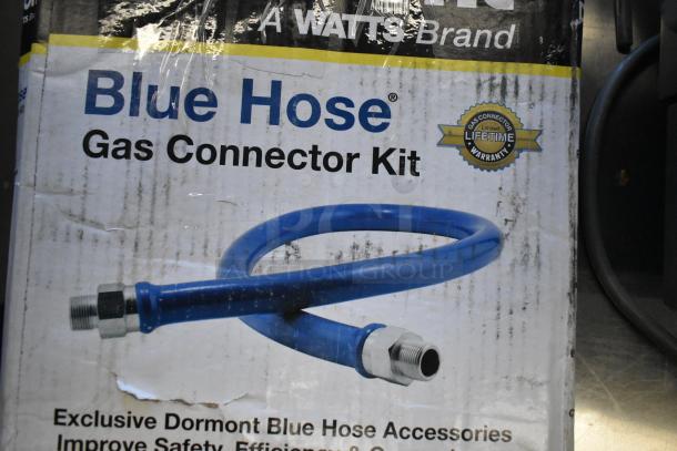 BRAND NEW Dormont 16100KIT48 Deluxe SnapFast 48" Gas Connector Kit with elbows, restraining cable, 1" diameter; packaging shows minor wear.