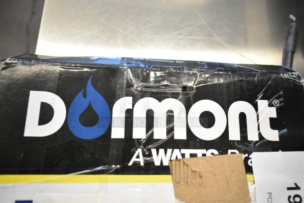 Brand new Dormont 16100KIT48 gas connector kit, 48", with two elbows and restraining cable, 1" diameter. Box shows scratches.