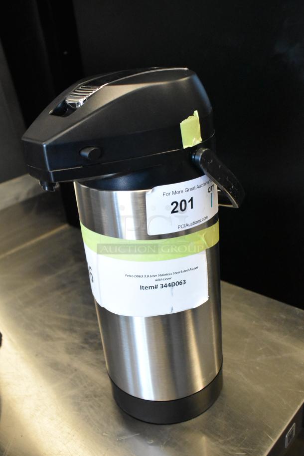 BRAND NEW 344D063 Fetco D063 3.8L stainless steel lined airpot with lever, labeled "Scratch and Dent."