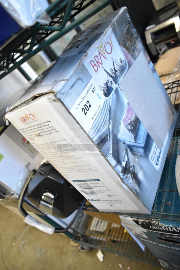 Brand new Edlund BRV-480 30 lb. digital portion scale in original box with visible wear. Includes ClearShield cover.