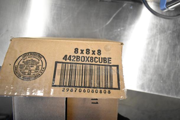 Cardboard box labeled “8x8x8” with Lavex Industrial certification marking. Scratch and dent condition.