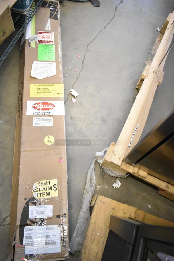 BRAND NEW SCRATCH AND DENT! Hatco GRAH-60 Glo-Ray Infrared Food Warmer, 60", 208V, 1 Phase, box with labels for high claim, model, and shipping.