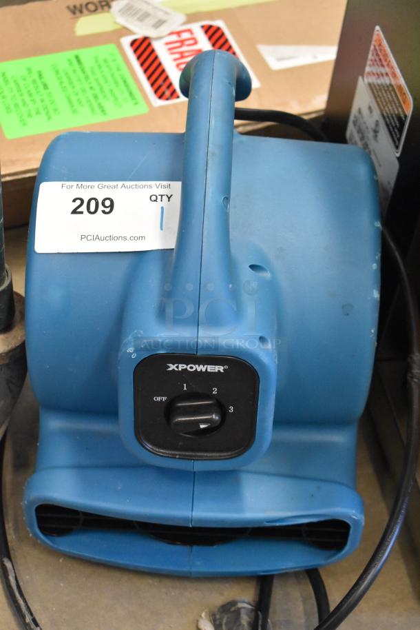 Brand new Xpower P-80A Air Mover, 115 Volts, 1 Phase, visible scratches, auction label indicating new condition.