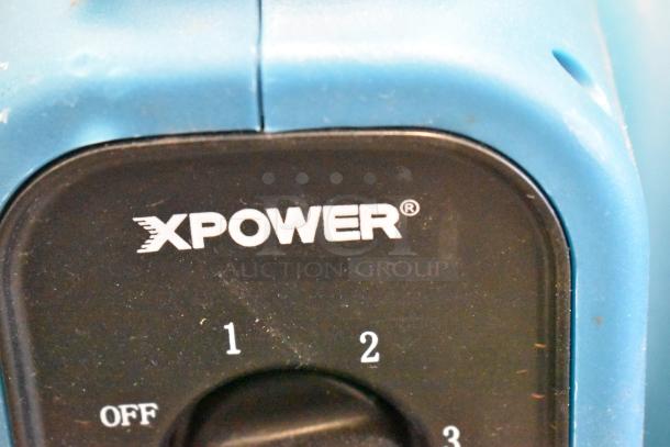 Alt text: Xpower P-80A Air Mover, 115V, 1 Phase, brand new with scratches and dents, featuring control dial on blue casing.