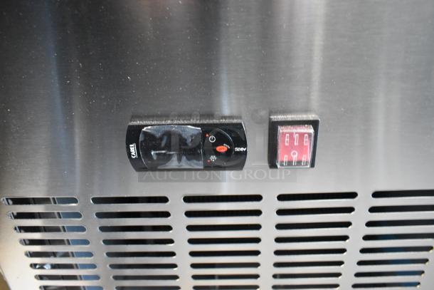 Brand new Avantco 178SSPPT3 stainless steel pizza prep table, scratch and dent, visible digital display, 115 Volts, 1 Phase.