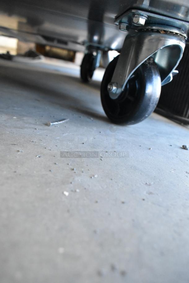 Brand new Avantco 178SSPPT3 stainless steel pizza prep table caster wheel, scratch and dent, 115V, 1 phase.