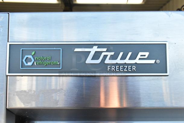 2022 True T-19F-HC stainless steel commercial freezer, single door, with poly coated racks, natural refrigerant label.