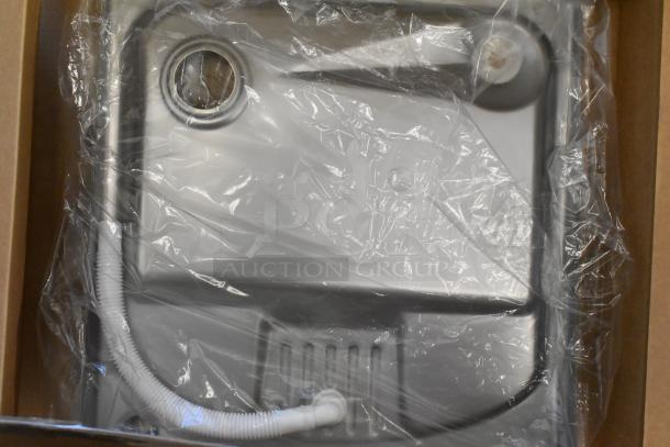 Brand new water bottle filling attachment in original packaging, slightly dented, includes flexible tubing, sealed in plastic.