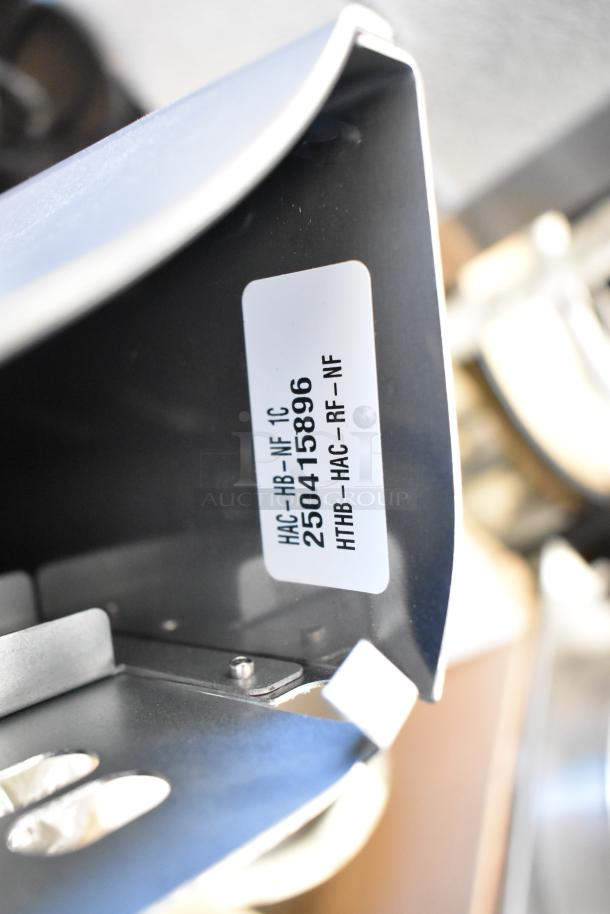 Three brand new scratch and dent water bottle filling attachments, model HAC-HB-NF 1C, with visible label 250415896.