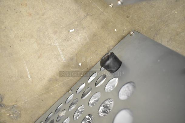 Cooking Performance Group CPG WOKR16N stainless steel wok range with 16" ring and black knob detail. Appears new with minor dents.